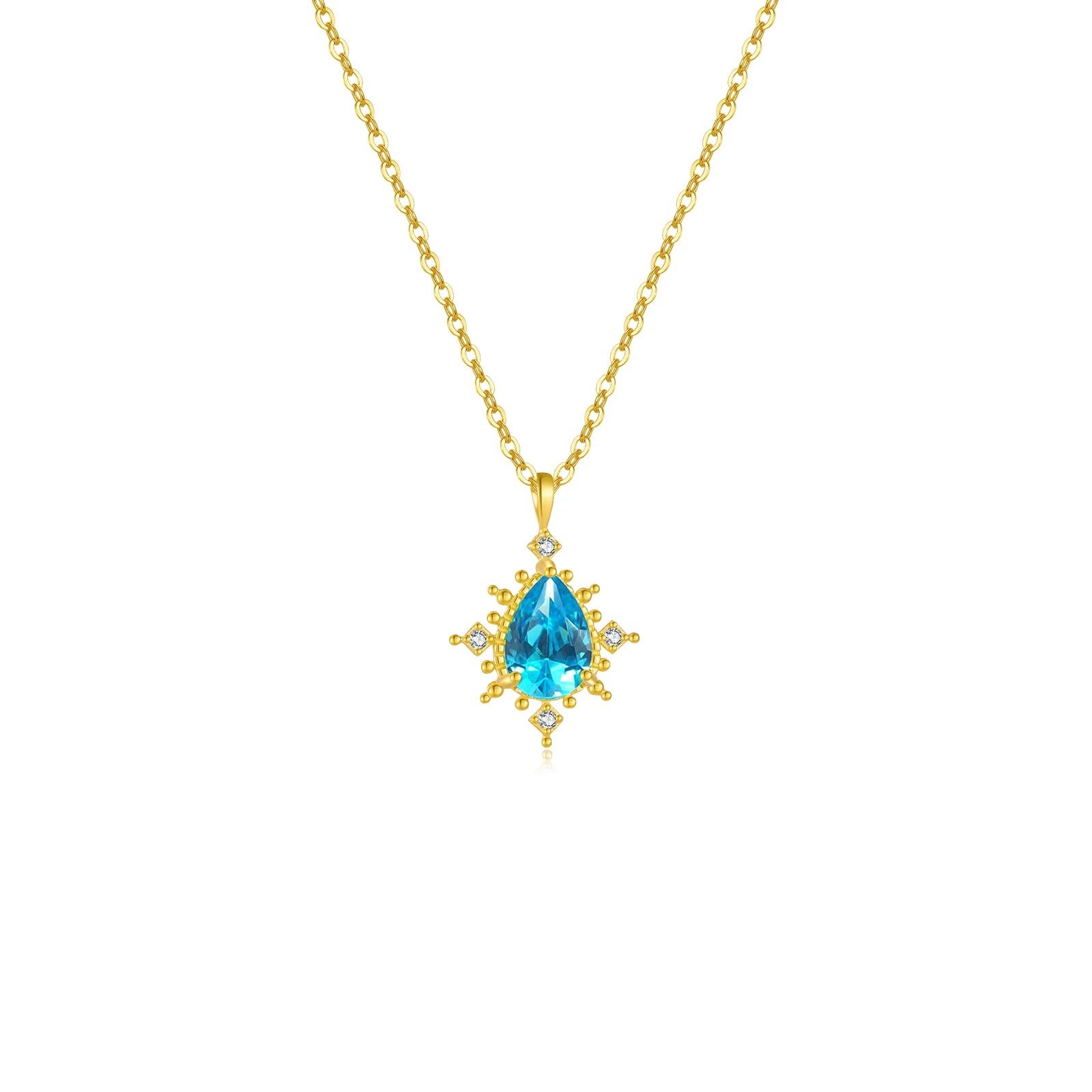Collier bleu avec un pendentif très lumineux et une chaîne dorée
