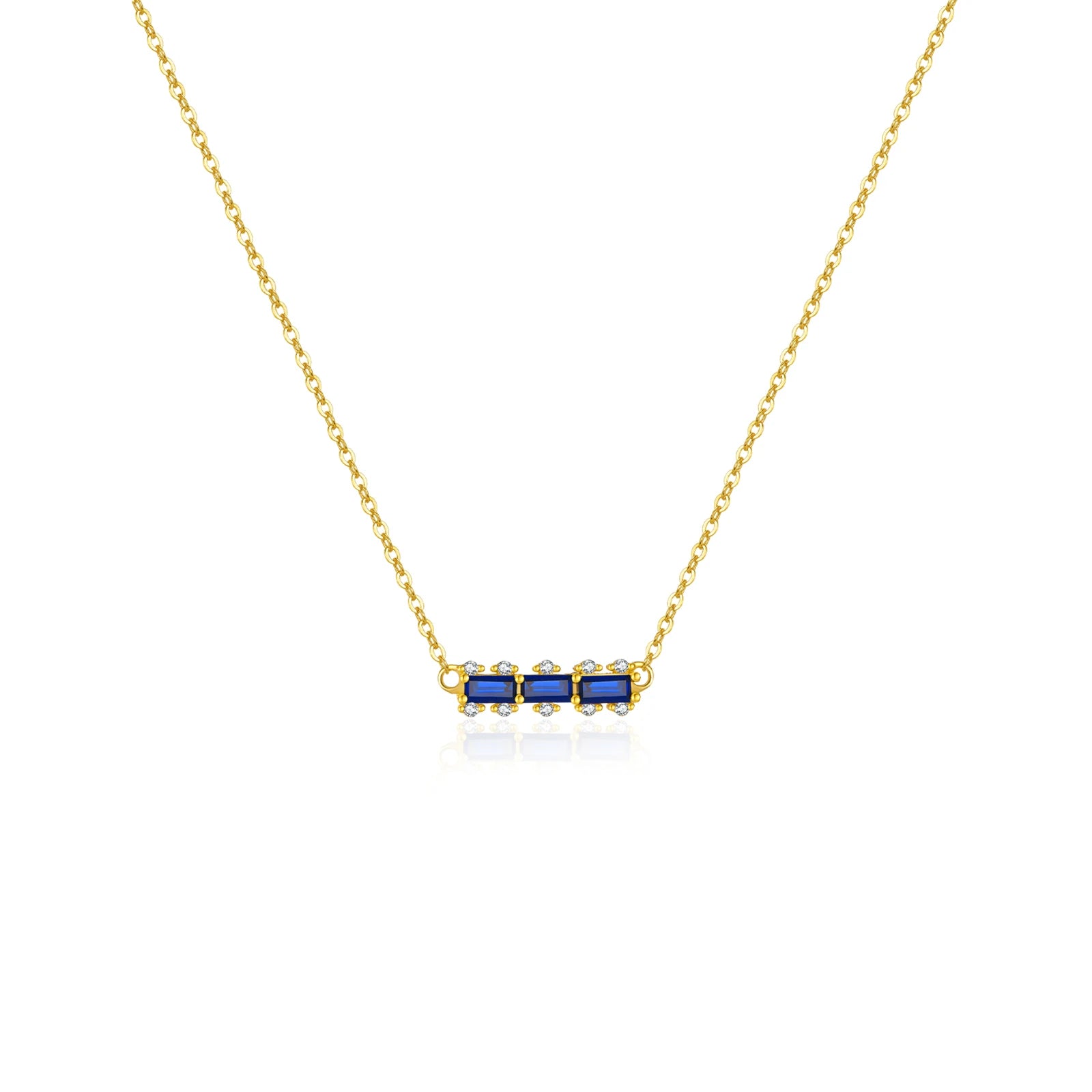 Collier bleu avec un pendentif rectangulaire et une chaîne dorée