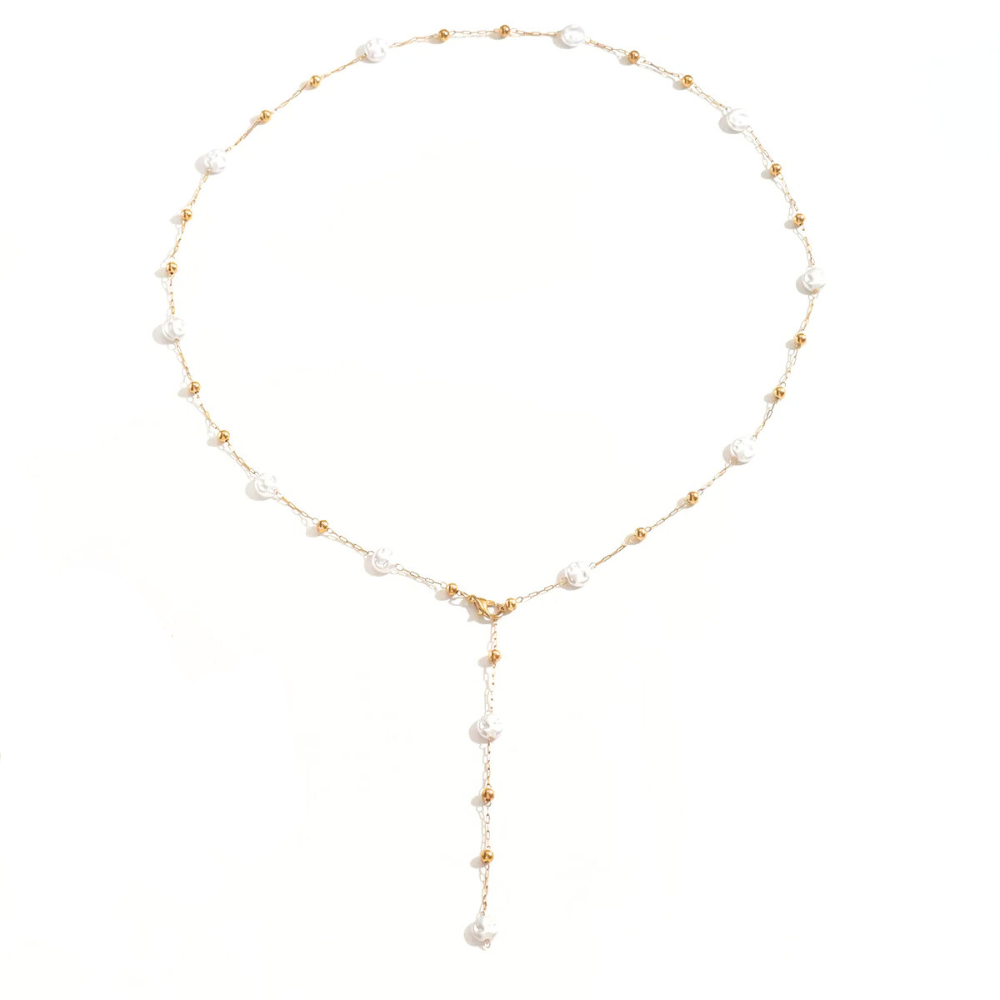 Collier en y avec une chaîne de couleur dorée et des motifs de couleur blanche
