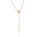 Collier en croix avec petites boules bleues 