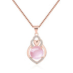 Collier rose avec une boule rose 