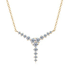 Collier en y avec une chaîne dorée et un pendentif argenté 