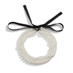 Collier noeud avec une chaîne blanche et épaisse 