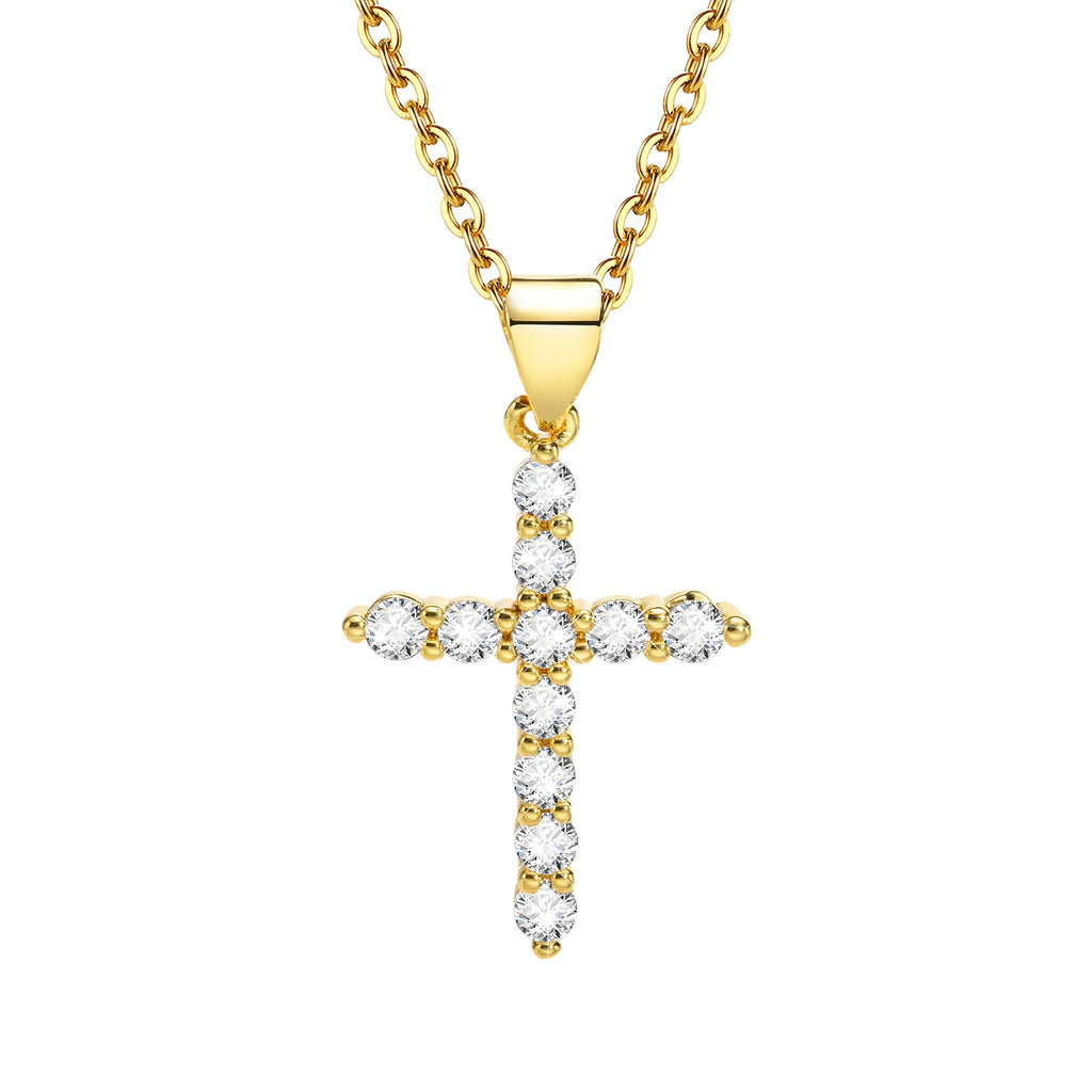 Collier croix femme avec une chaîne dorée et des détails subtils sur le pendentif