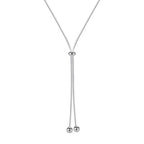 Collier sautoir de couleur grise et très long 