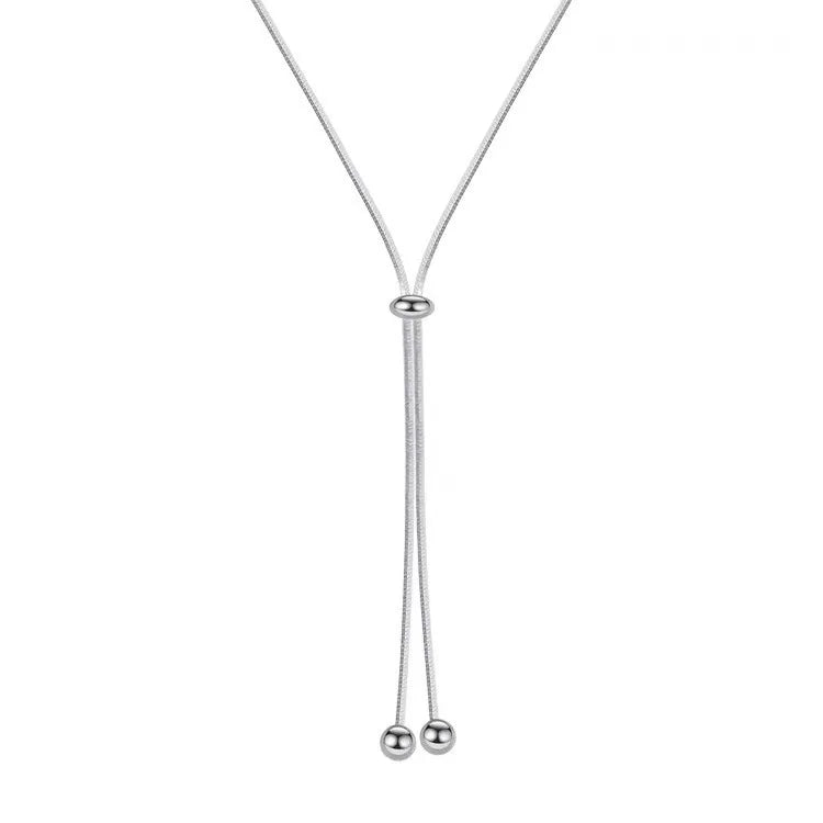 Collier sautoir de couleur grise et très long 