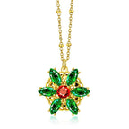 Collier vert avec pendentif en forme de fleur verte et dorée 