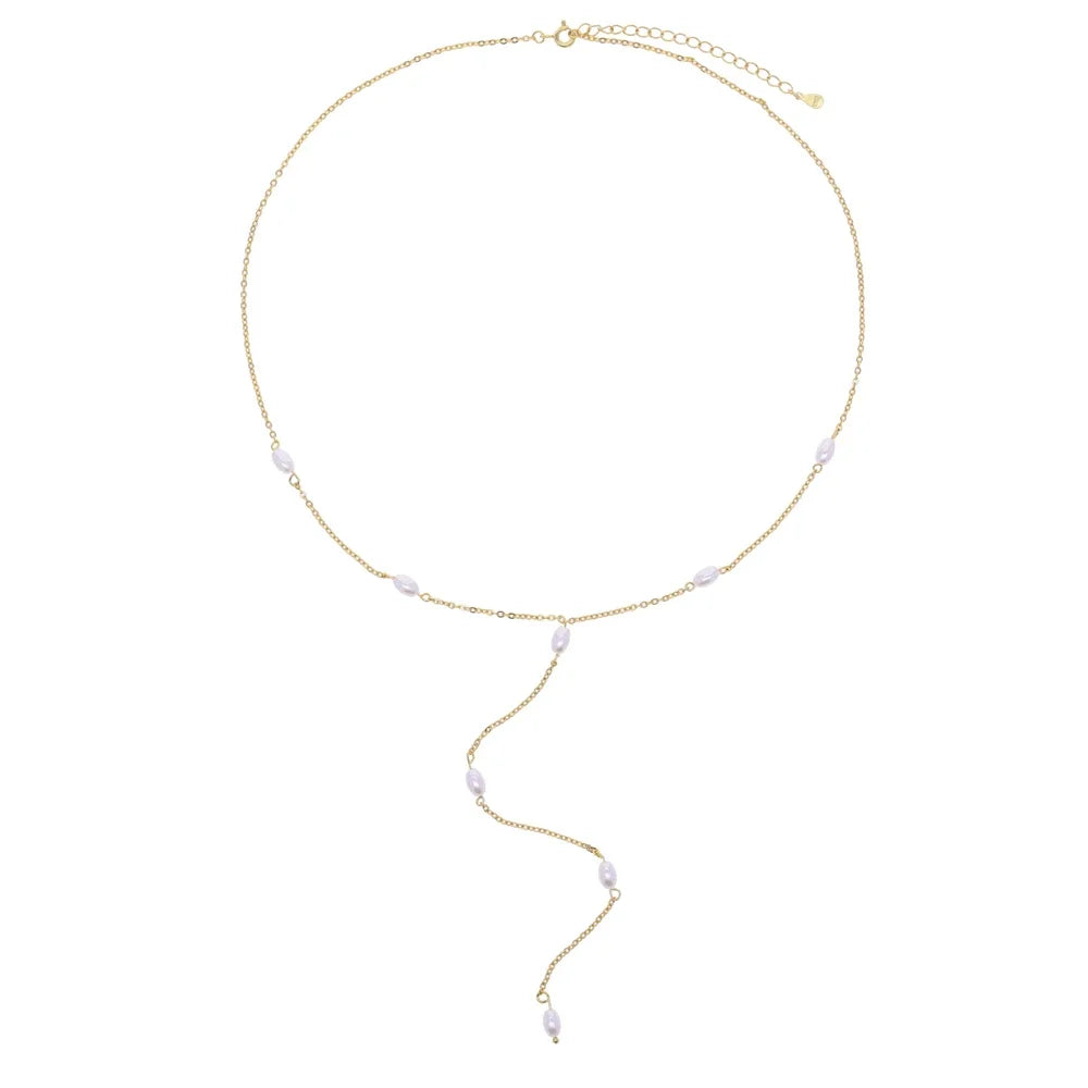 Collier en y avec une chaîne dorée composée de petites boules blanches