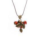 Collier rouge avec pendentif en forme de cerises 
