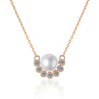 Collier fin de couleur rose avec pendentif en forme de boule blanche 