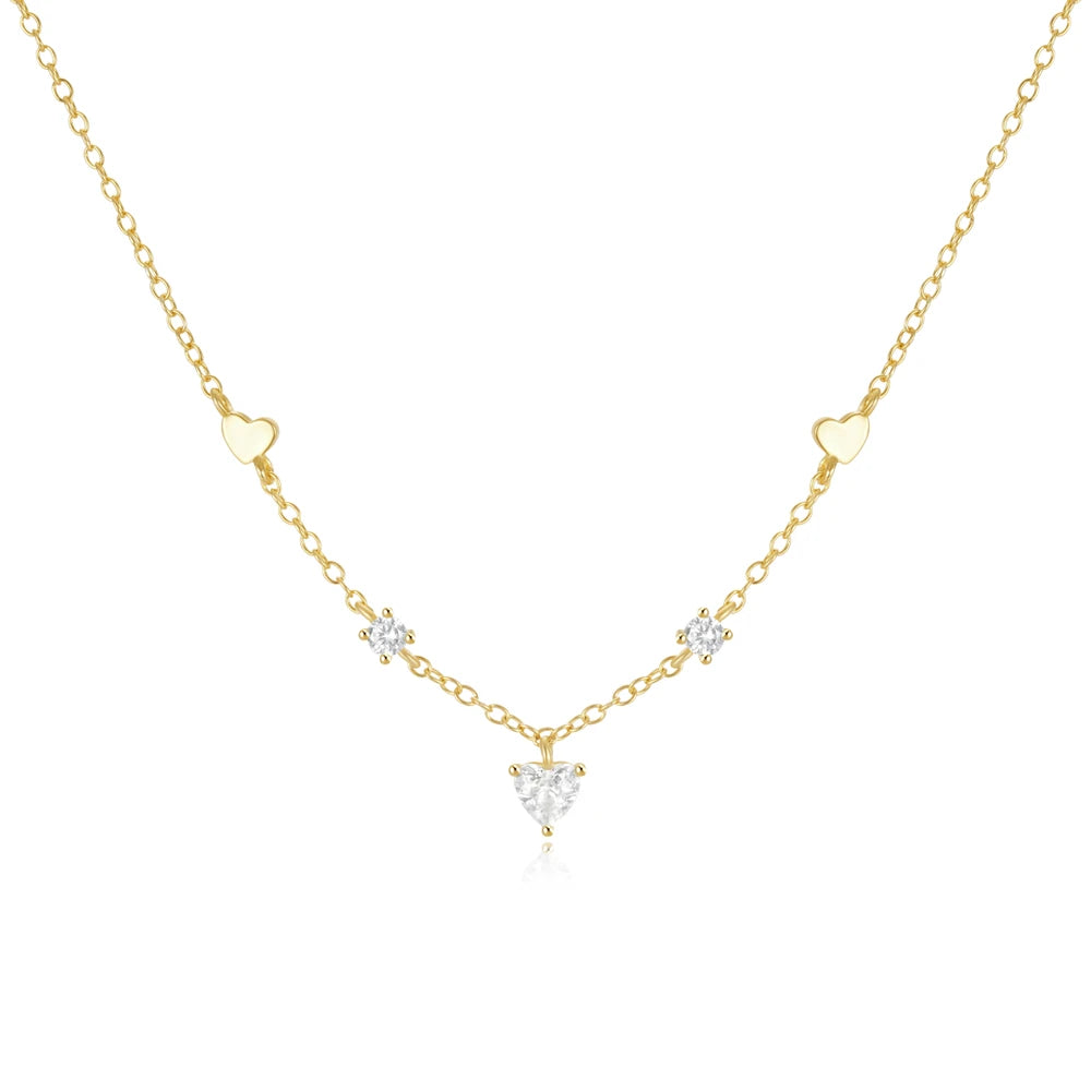 Collier minimaliste doré avec deux petits cœurs 
